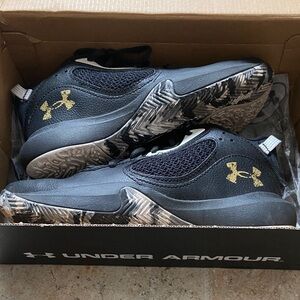 Under Armour Youth Black Athletic Shoes with Gold Accents